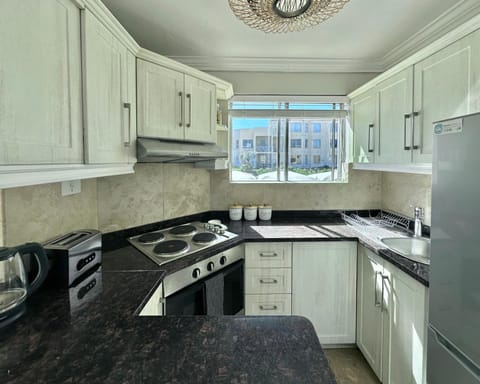 Kitchen or kitchenette, oven, stove