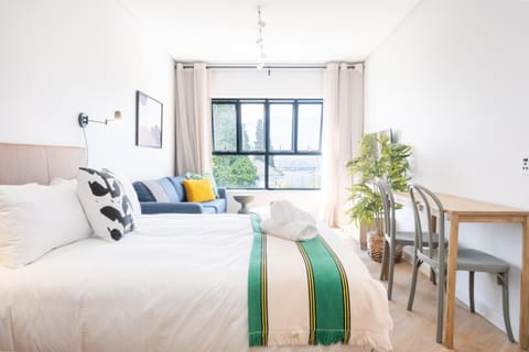 Bed, Living room, Seating area