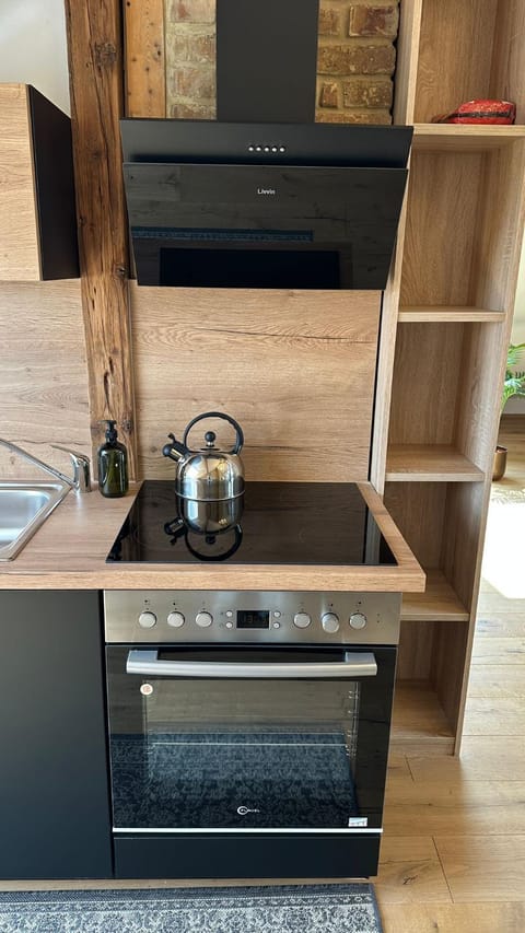 Kitchen or kitchenette, stove