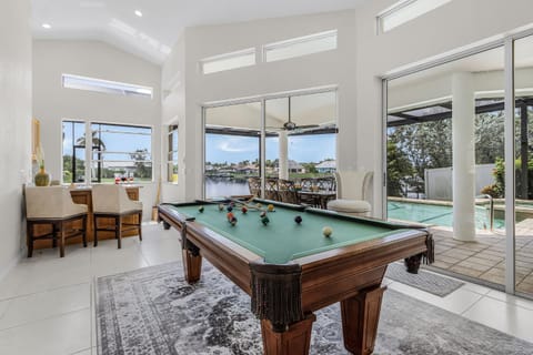 Riverfront Luxury with Heated Pool, Spa & Private Dock - Sunny Shores Escape House in Cape Coral