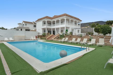 Property building, Living room, Swimming pool