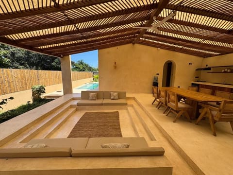 Day, View (from property/room), Living room, Seating area, Swimming pool
