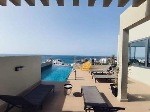 Patio, Sea view, Swimming pool, sunbed