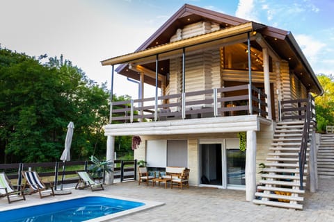 Property building, Day, View (from property/room), Swimming pool, sunbed