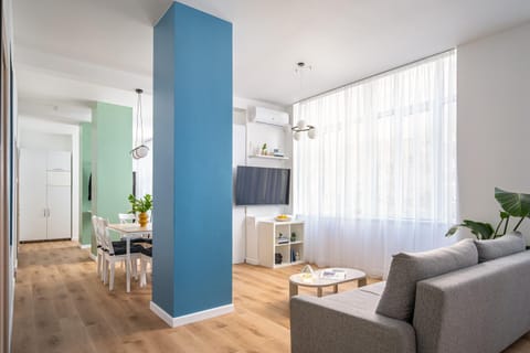 TV and multimedia, Living room, Dining area, Quiet street view, furniture, internet, wardrobe, air conditioner