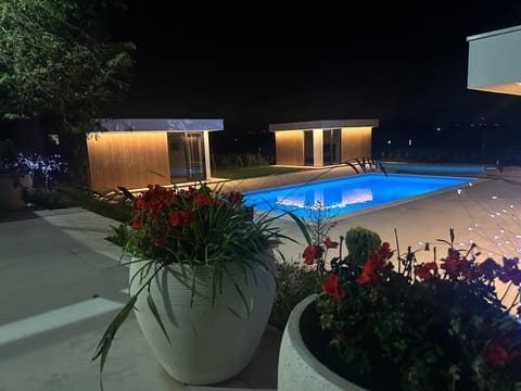Property building, Night, Pool view, Swimming pool