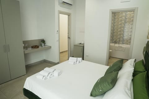 Bed, Bathroom, Photo of the whole room, Bedroom, towels, wardrobe, air conditioner