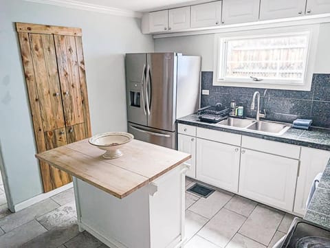 Kitchen or kitchenette, dishwasher, oven, stove, toaster