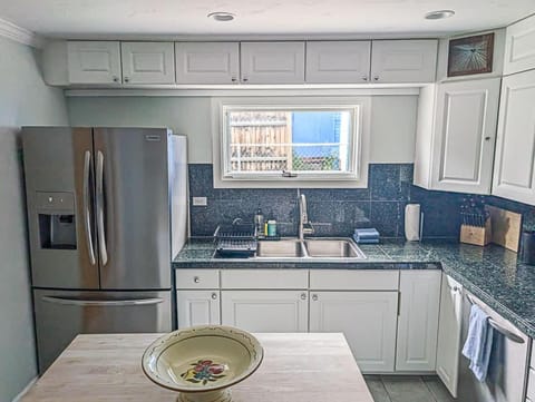 Kitchen or kitchenette, dishwasher, oven, stove, toaster