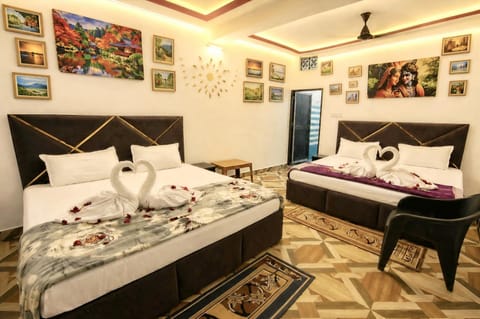 Bed, Photo of the whole room, Bedroom, towels, air conditioner