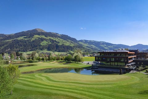 Property building, Day, Natural landscape, Golfcourse, Mountain view