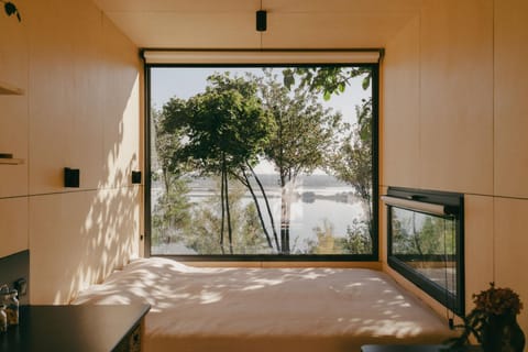 Bed, Natural landscape, View (from property/room), Bedroom, River view