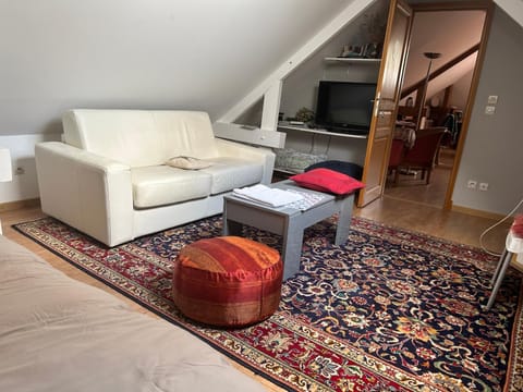 Bed, Living room, Seating area, Bedroom