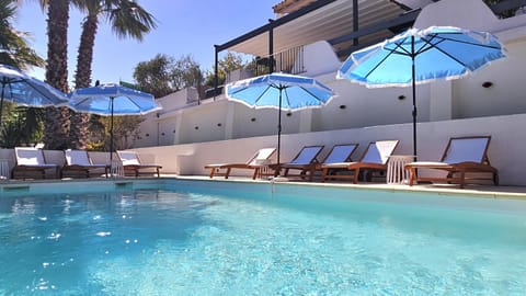 Patio, Natural landscape, Pool view, Swimming pool, sunbed