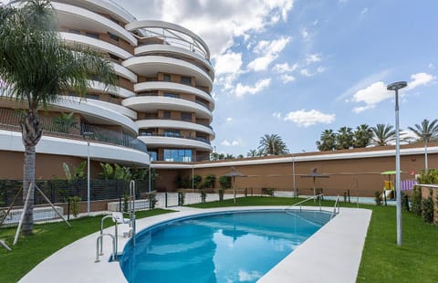 Property building, Day, Children play ground, Pool view, Swimming pool, Swimming pool, sunbed
