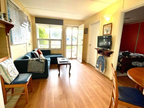 Property building, Communal lounge/ TV room, TV and multimedia, Living room, Seating area, Dining area