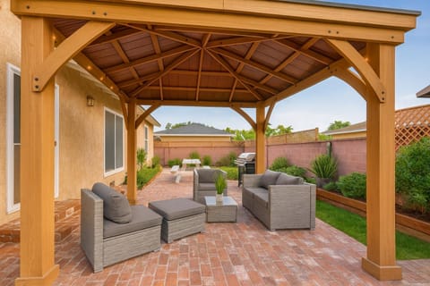 Property building, Patio, Day, Garden, Living room, Seating area, Garden view