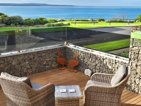 Property building, Patio, Day, Natural landscape, View (from property/room), Seating area, Sea view
