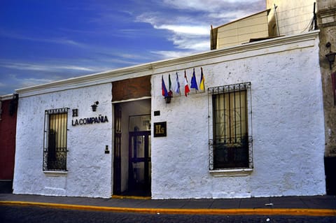 Property building, Facade/entrance, Day, Property logo or sign, Lobby or reception, Decorative detail, Street view