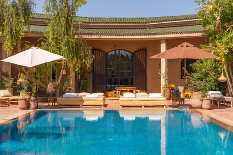 Property building, Patio, Pool view, Swimming pool, Swimming pool, sunbed