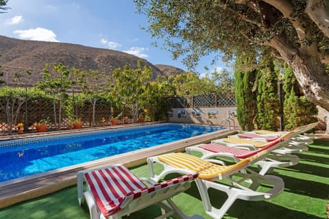 Property building, Living room, Swimming pool