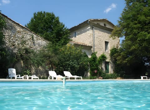 Property building, Living room, Swimming pool