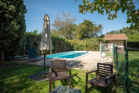 Property building, Living room, Swimming pool