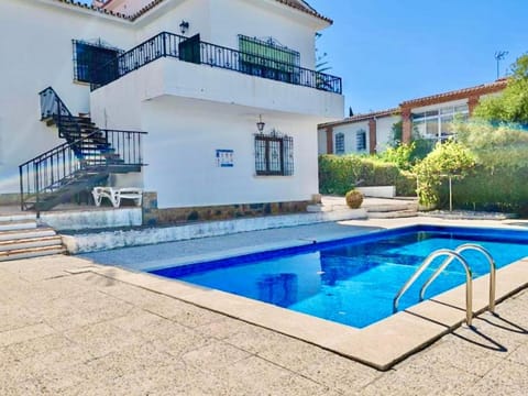 Property building, Patio, Day, Pool view, Swimming pool