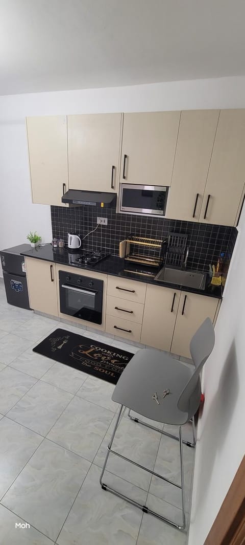 Kitchen or kitchenette, stove