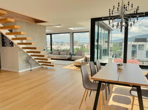 View (from property/room), Living room, Seating area, Dining area