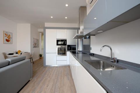 Kitchen or kitchenette, Living room, Dining area, dishwasher, oven, stove