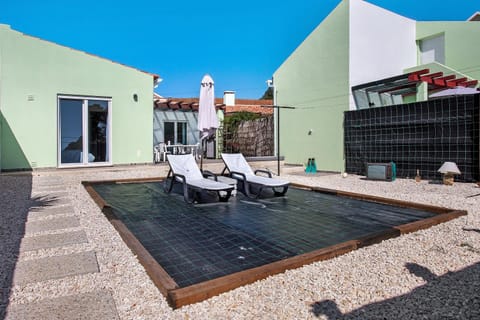 Property building, Living room, Swimming pool