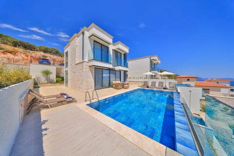 Property building, Pool view, Swimming pool, sunbed