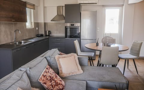 Kitchen or kitchenette, Living room, Seating area, oven, stove