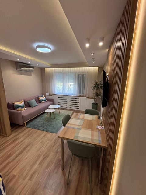 TV and multimedia, Living room, Photo of the whole room, Seating area, Dining area, air conditioner