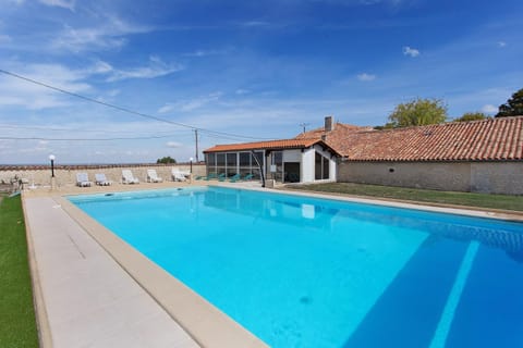 Property building, Living room, Swimming pool
