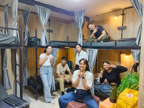 People, group of guests, bunk bed
