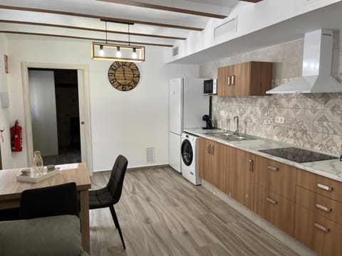 Kitchen or kitchenette, Living room, stove, washing machine