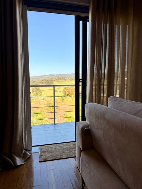 Natural landscape, View (from property/room), Balcony/Terrace, Living room, Seating area, Mountain view
