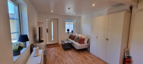 Property building, Living room, Seating area, wardrobe
