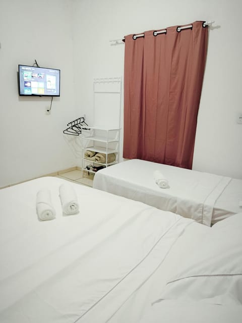 Bed, TV and multimedia, Photo of the whole room, Decorative detail, Bedroom, Guests, Area and facilities, group of guests, Family, flat iron, furniture, hair dryier, internet, locker, towels, air conditioner