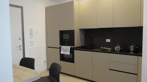 Kitchen or kitchenette, oven