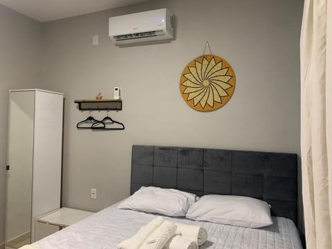 Bed, Photo of the whole room, Bedroom, towels, air conditioner