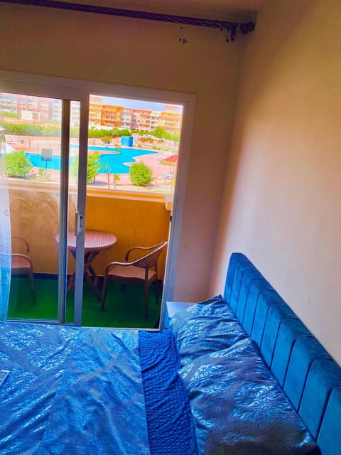 View (from property/room), Balcony/Terrace, Bedroom, Pool view
