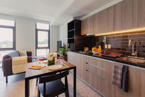 Kitchen or kitchenette, Living room, Seating area, Dining area, stove