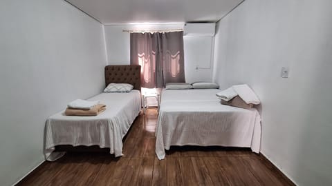 Bed, air conditioner