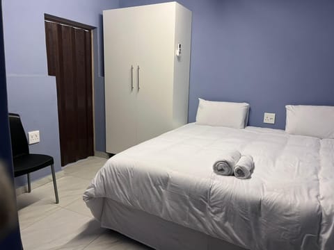 Bed, Photo of the whole room, Bedroom, towels, wardrobe