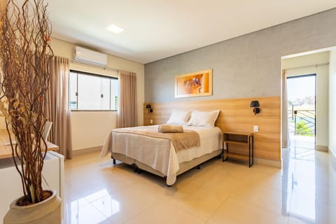 Bed, Photo of the whole room, towels, air conditioner