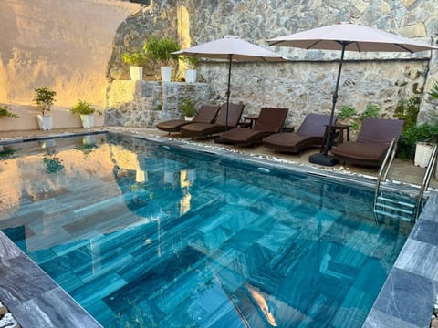 Swimming pool, sunbed