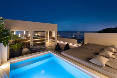 Property building, Night, View (from property/room), Balcony/Terrace, Seating area, Pool view, Sea view, Swimming pool, sunbed